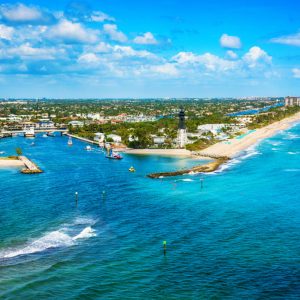 The Hillsboro Inlet separating the city of Pompano Beach to the south and Lighthouse Point community of Deerfield Beach to the north shot during a helicopter photo flight from an altitude of about 200 feet over the Atlantic Ocean.